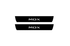 Catalog illustration of two black front door sill plates with MDX lettering.