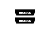 Catalog illustration of two black rear door sill plates with Brabus lettering.