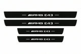 Catalogue illustration of two front and two rear black Matte PRO LED door sill plates with illuminated AMG E43 lettering for Mercedes-Benz E-Class Estate S213; final dimensions are selected during manufacture.