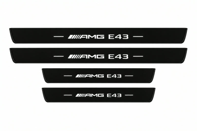 Catalogue illustration of two front and two rear black Matte PRO LED door sill plates with illuminated AMG E43 lettering for Mercedes-Benz E-Class Estate S213; final dimensions are selected during manufacture.
