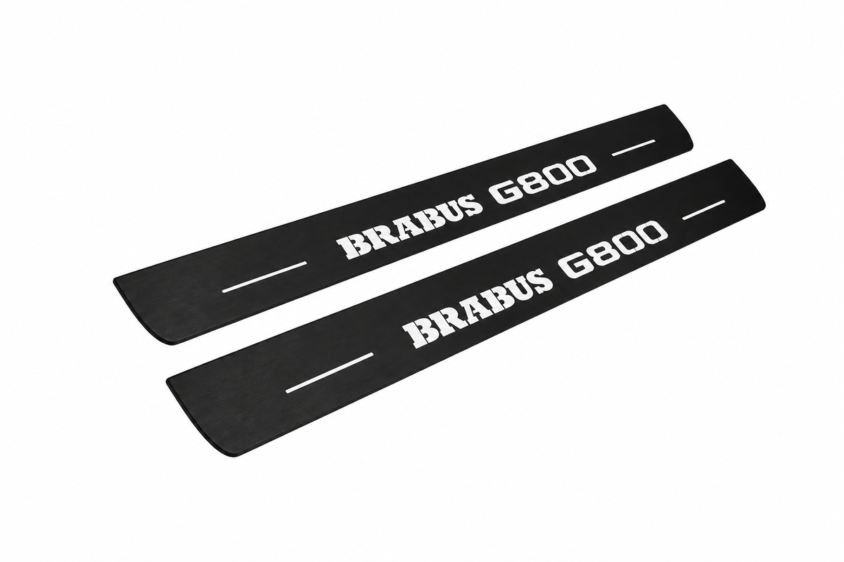 Catalogue illustration showing two FRONT black Matte PRO LED door sill plates with white Brabus G800 lettering for Mercedes-Benz G-Class W463; FRONT+REAR is available but rear plates are not pictured; dimensions are selected during manufacture.