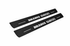 Catalogue illustration showing two FRONT black Matte PRO LED door sill plates with white Brabus G800 lettering for Mercedes-Benz G-Class W463; FRONT+REAR is available but rear plates are not pictured; dimensions are selected during manufacture.
