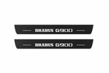 Catalogue illustration showing two FRONT black Matte PRO LED door sill plates with white Brabus G900 lettering for Mercedes-Benz G-Class W463; FRONT+REAR is available but rear plates are not pictured; dimensions are selected during manufacture.