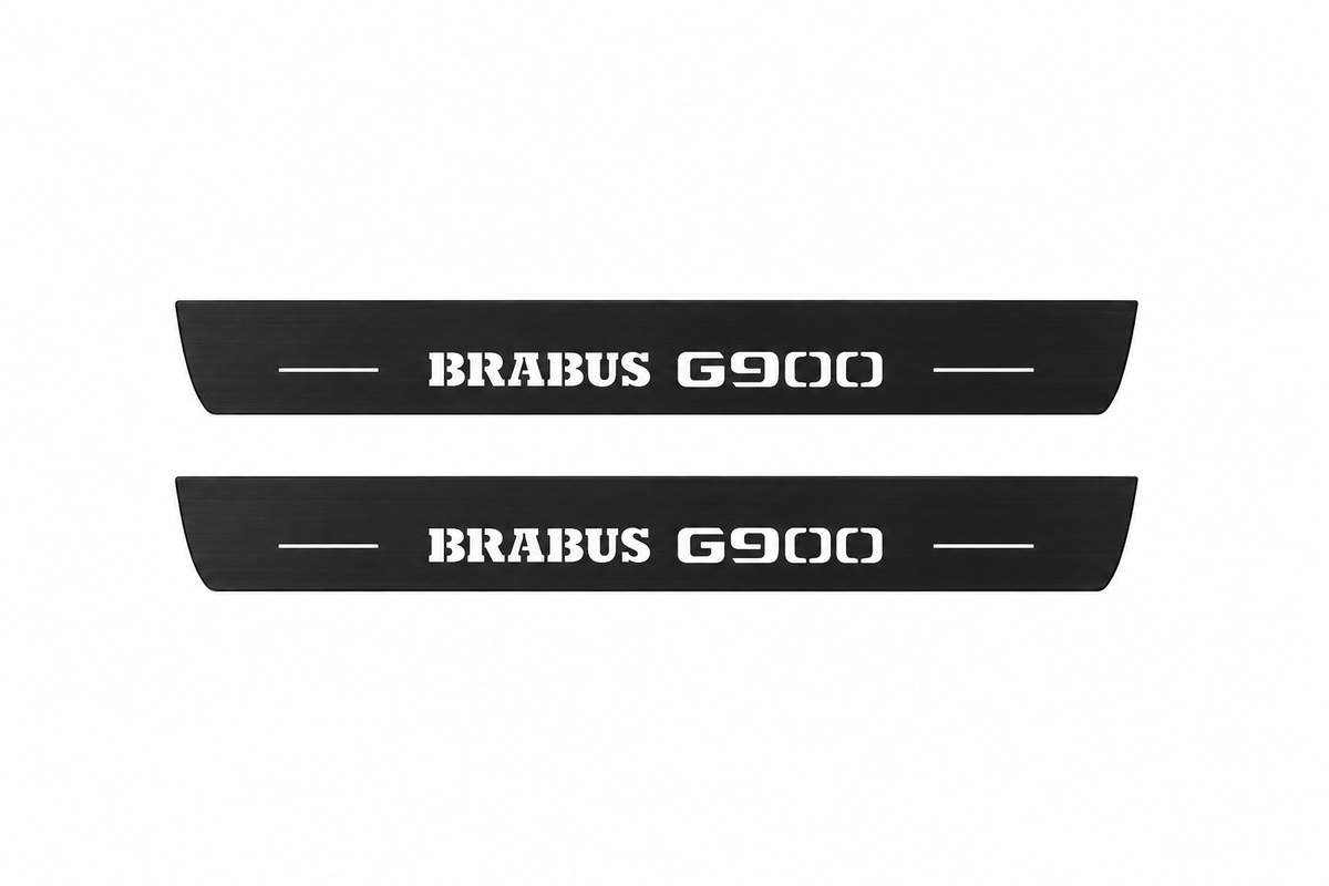 Catalogue illustration showing two FRONT black Matte PRO LED door sill plates with white Brabus G900 lettering for Mercedes-Benz G-Class W463; FRONT+REAR is available but rear plates are not pictured; dimensions are selected during manufacture.