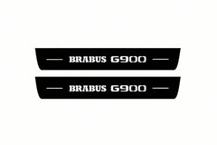 Catalogue illustration of two front black Matte PRO LED door sill plates with illuminated Brabus G900 lettering for Mercedes-Benz G-Class W465; dimensions are selected during manufacture.
