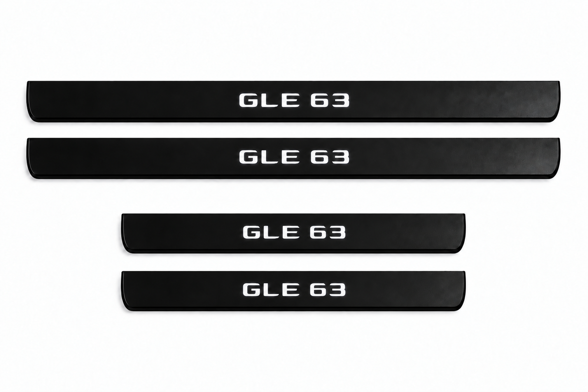 Catalog illustration of two front and two rear black Matte PRO door sill plates with GLE 63 lettering illuminated only on top; opaque unlit edges. Final dimensions selected for Mercedes-Benz GLE W167.