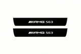 Catalogue illustration of two front black Matte PRO LED door sill plates with illuminated AMG S63 lettering for Mercedes S-Class C217; dimensions are selected during manufacture.