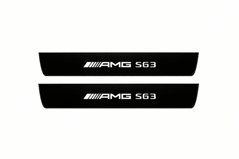 Catalogue illustration of two front black Matte PRO LED door sill plates with illuminated AMG S63 lettering for Mercedes S-Class C217; dimensions are selected during manufacture.