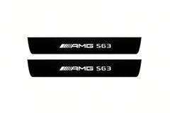 Catalogue illustration of two front black Matte PRO LED door sill plates with illuminated AMG S63 lettering for Mercedes S-Class C217; dimensions are selected during manufacture.