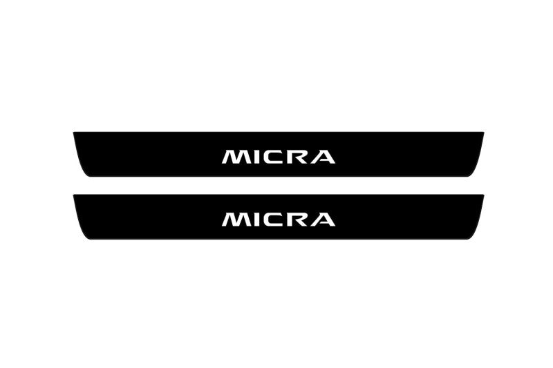 Nissan Micra V 2017+ illuminated door sill protectors in matte black coated stainless steel with Micra logo