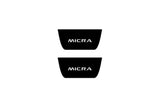 Nissan Micra V 2017+ illuminated door sill protectors matte black coated stainless steel with Micra logo
