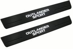 Catalogue illustration of two front black Matte PRO LED door sill plates with illuminated Outlander Sport lettering for Mitsubishi Outlander Sport GA; dimensions are selected during manufacture.