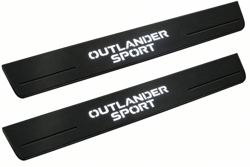 Catalogue illustration of two front black Matte PRO LED door sill plates with illuminated Outlander Sport lettering for Mitsubishi Outlander Sport GA; dimensions are selected during manufacture.
