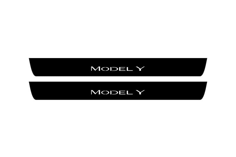 Tesla Model Y 2020+ illuminated entry guards in stainless steel with Model Y logo