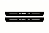 Catalogue illustration of two front black Matte PRO LED door sill plates with illuminated Primastar lettering for Nissan Primastar; dimensions are selected during manufacture.