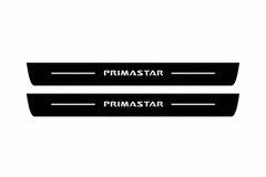 Catalogue illustration of two front black Matte PRO LED door sill plates with illuminated Primastar lettering for Nissan Primastar; dimensions are selected during manufacture.