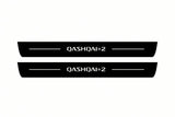 Catalogue illustration of two front black Matte PRO LED door sill plates with illuminated Qashqai +2 lettering for Nissan Qashqai I J10; dimensions are selected during manufacture.