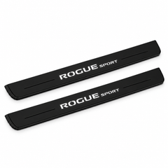 Catalogue illustration of two black Matte PRO front door sill plates with illuminated ROGUE SPORT lettering on the top surface. Edges are unlit; rear plates for FRONT+REAR are not pictured. Final dimensions are selected for Nissan Rogue Sport J11 during manufacture.