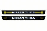 Catalogue illustration of two front black Matte PRO LED door sill plates with illuminated TIIDA lettering for Nissan Tiida C11; dimensions are selected during manufacture.