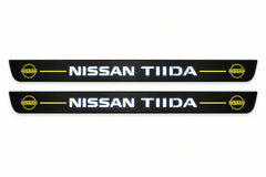 Catalogue illustration of two front black Matte PRO LED door sill plates with illuminated TIIDA lettering for Nissan Tiida C11; dimensions are selected during manufacture.