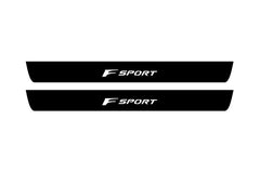 Catalog illustration of two black front door sill plates with F Sport lettering.