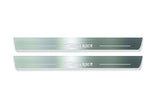 Two long silver-finished door sill plates with Charger lettering on a light background, straight-on view.