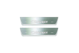 Two short silver-finished door sill plates with Charger lettering on a light background, straight-on view.