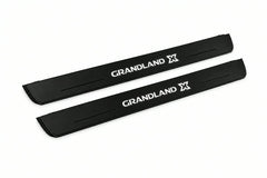 Catalogue illustration of two front black Matte PRO LED door sill plates with illuminated Grandland X lettering for Opel Grandland X; dimensions are selected during manufacture.