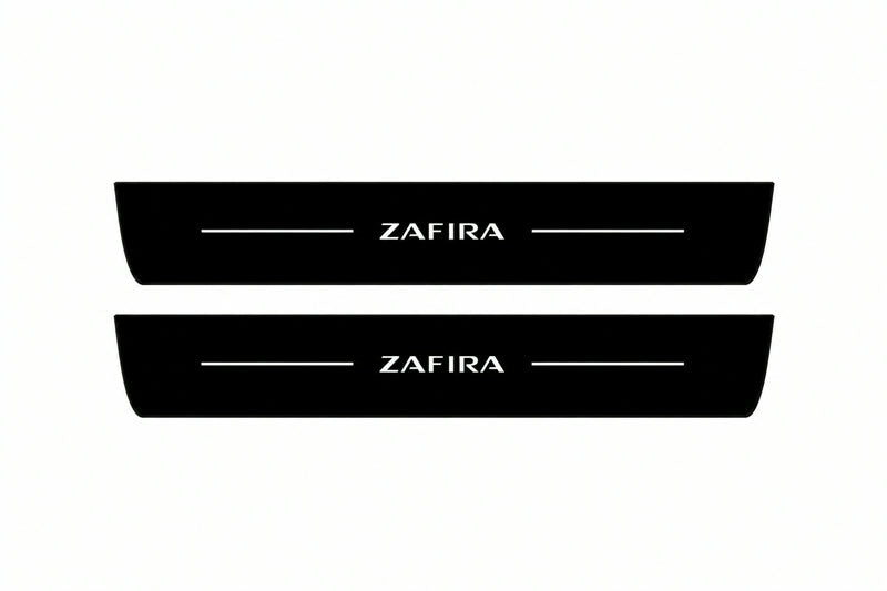 Catalogue illustration of two front black Matte PRO LED door sill plates with illuminated Zafira lettering for Opel Zafira MPV A05; dimensions are selected during manufacture.