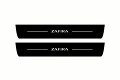 Catalogue illustration of two front black Matte PRO LED door sill plates with illuminated Zafira lettering for Opel Zafira MPV P12; dimensions are selected during manufacture.