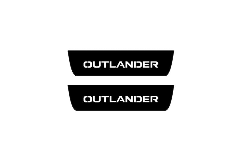 Mitsubishi Outlander IV 2021+ illuminated entry guards in stainless steel with Outlander logo