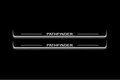 Two long door sill plates with Pathfinder lettering and edges illuminated in white, straight-on view on a dark background.