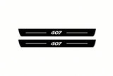Catalogue illustration of two front black Matte PRO LED door sill plates with illuminated 407 lettering for Peugeot 407; dimensions are selected during manufacture.