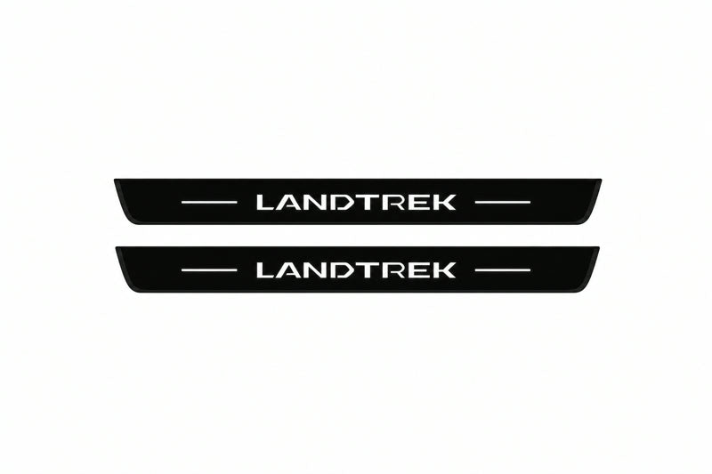Catalogue illustration of two front black Matte PRO LED door sill plates with illuminated Landtrek lettering for Peugeot Landtrek; dimensions are selected during manufacture.
