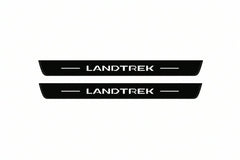 Catalogue illustration of two front black Matte PRO LED door sill plates with illuminated Landtrek lettering for Peugeot Landtrek; dimensions are selected during manufacture.