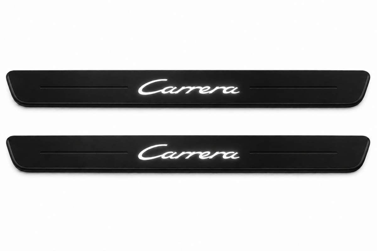 Catalogue illustration of two black Matte PRO front sill plates with illuminated cursive Carrera lettering on top. Side edges remain unlit; no rear plates or exact dimensions pictured.