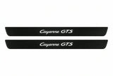 Catalogue illustration of two front black Matte PRO LED door sill plates with illuminated Cayenne GTS lettering for Porsche Cayenne 9Y0; dimensions are selected during manufacture.