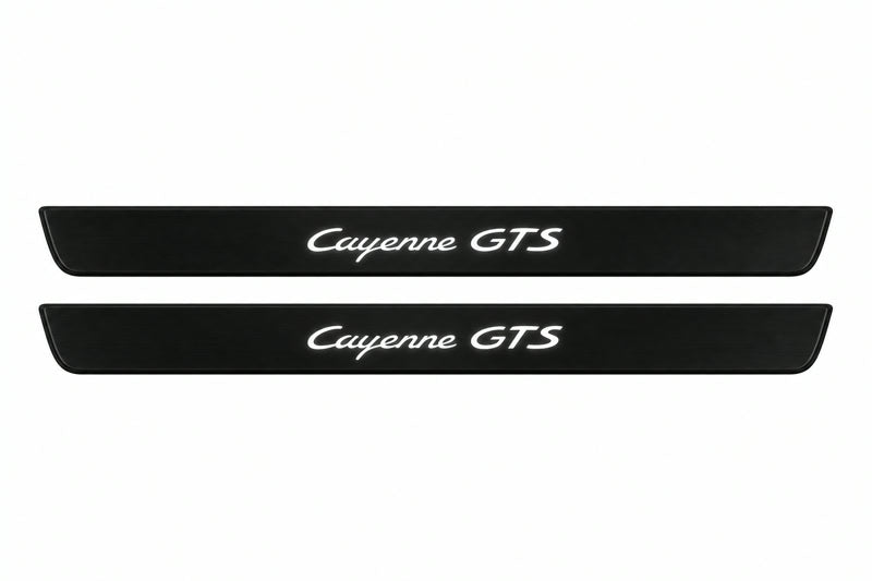 Catalogue illustration of two front black Matte PRO LED door sill plates with illuminated Cayenne GTS lettering for Porsche Cayenne 9Y0; dimensions are selected during manufacture.
