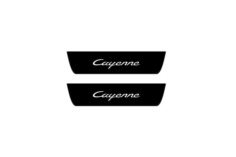 Catalog illustration of two black rear door sill plates with Cayenne lettering.