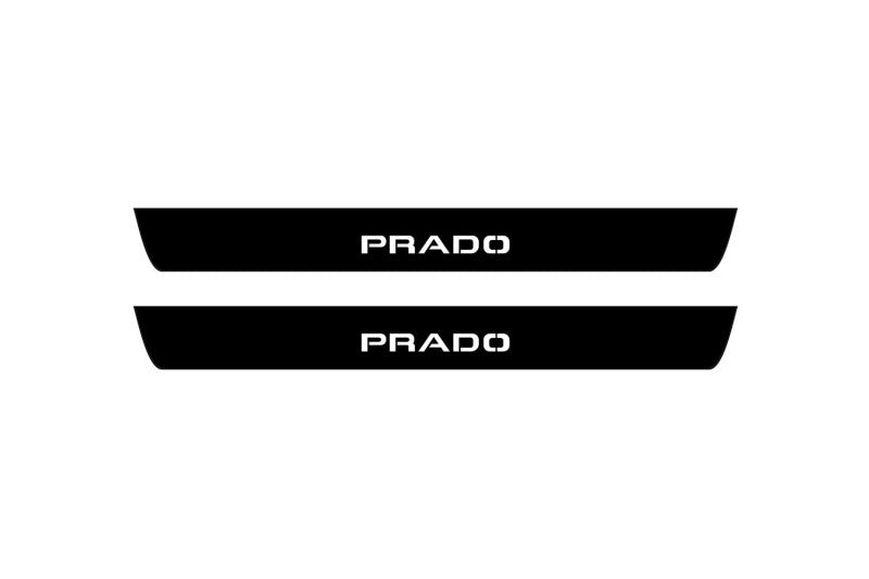 Toyota Prado 250 2023+ illuminated entry guards in matte black coated stainless steel with Prado logo