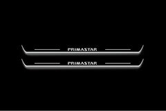 Two long door sill plates with Primastar lettering and edges illuminated in white, straight-on view on a dark background.