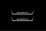 Audi A6 C7 2011+ illuminated entry guards in stainless steel with Quattro logo