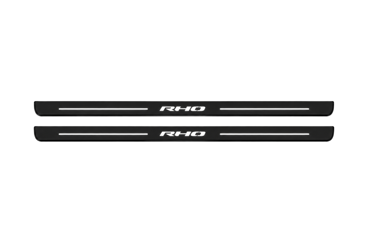 Matte PRO catalogue illustration showing two FRONT plates with illuminated RHO lettering on a white background; Ram 1500 DT dimensions are selected during manufacture; rear plates are not pictured.