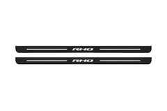 Matte PRO catalogue illustration showing two FRONT plates with illuminated RHO lettering on a white background; Ram 1500 DT dimensions are selected during manufacture; rear plates are not pictured.
