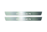Two long silver-finished door sill plates with Ranger in block lettering lettering on a light background, straight-on view.