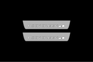 Illuminated LED Door Sills – Tread Plates Nissan Rogue III 2021+ With Rock Creek Logo LED Illuminated Nissan Led Door Sills opdesign