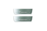 Two short silver-finished door sill plates with R Design lettering on a light background, straight-on view.