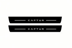 Catalogue illustration of two front black Matte PRO LED door sill plates with illuminated Captur lettering for Renault Captur I J87; dimensions are selected during manufacture.