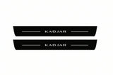 Catalogue illustration of two front black Matte PRO LED door sill plates with illuminated Kadjar lettering for Renault Kadjar; dimensions are selected during manufacture.