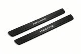Catalogue illustration of two front black Matte PRO LED door sill plates with illuminated Megane lettering for Renault Megane II; dimensions are selected during manufacture.